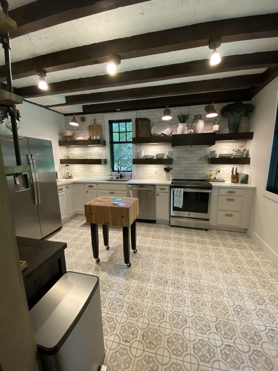 Enjoy the John Voos rolling butcher block island!