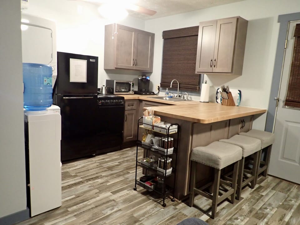 Open floor plan kitchen and dining area with laundry center. Jan ‘22