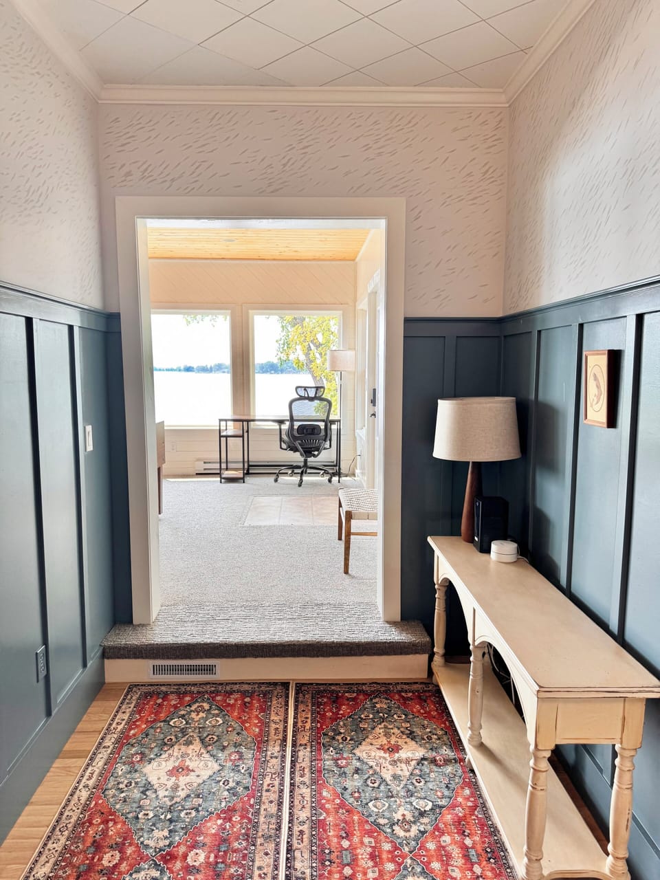 Upstairs hallway with view to the sunroom