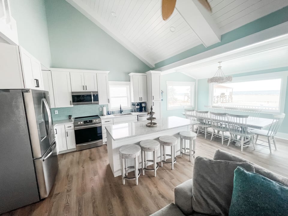 Brand new, stainless steel appliances, dining room for 10, and island seats 4.