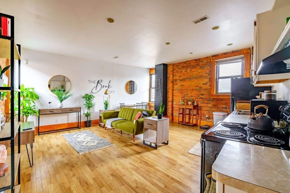 "This modern home has lots of wonderful decor and plants that work well together. The plants are mostly rare and are from different parts of the world, giving a green ang jungle-y vibe through the place."