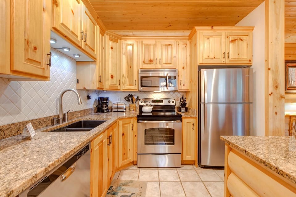 Your fully equipped kitchen includes stainless appliances, granite countertops, and everything needed for home-cooked meals.
