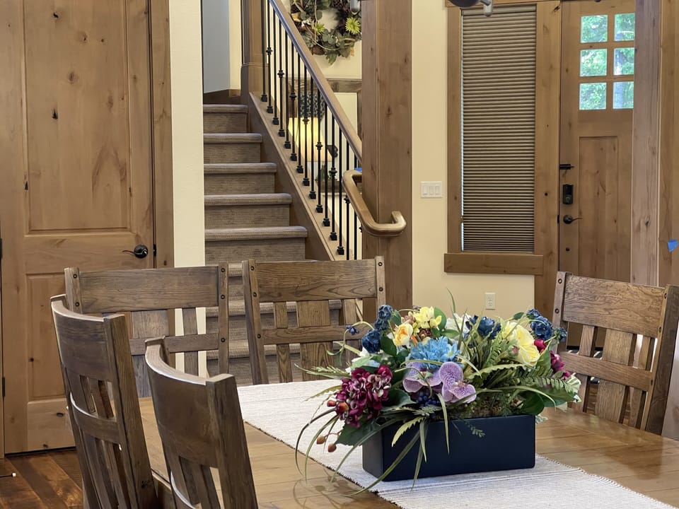 Classy table w/10 chairs for dining, working, puzzle making or socializing.
