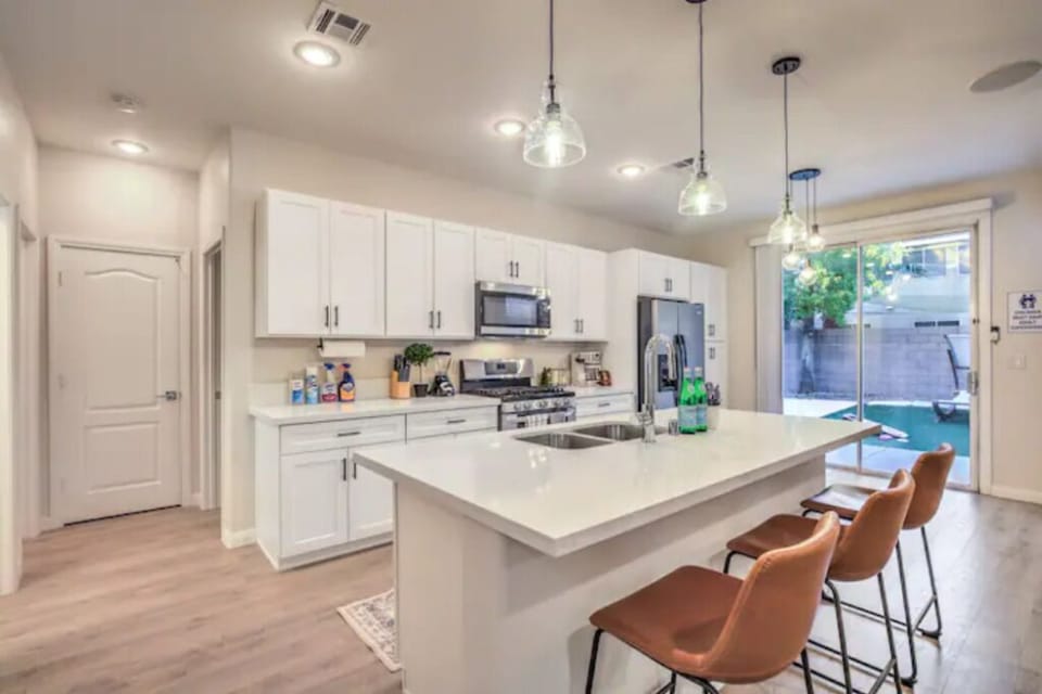 Watch the chef in action while enjoying a few drinks at the kitchen island.
