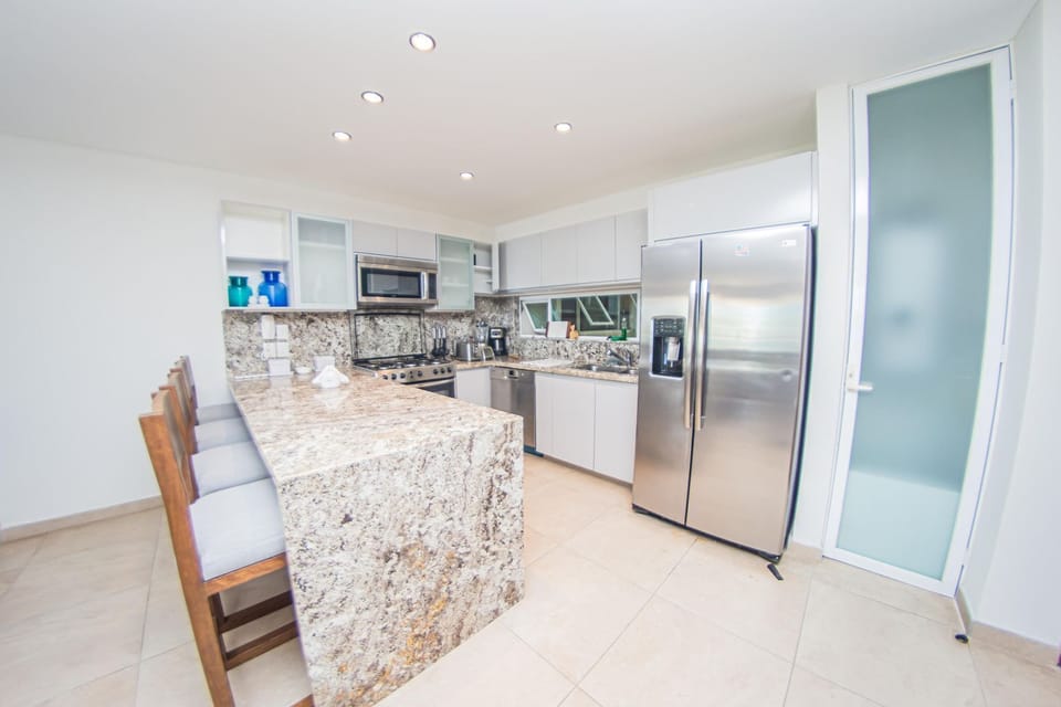 Kitchen with granite countertop, and Bosch appliances