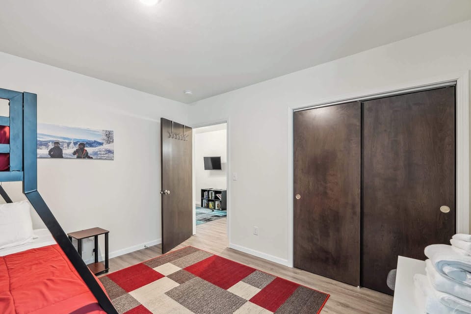 Bunk room with closet
