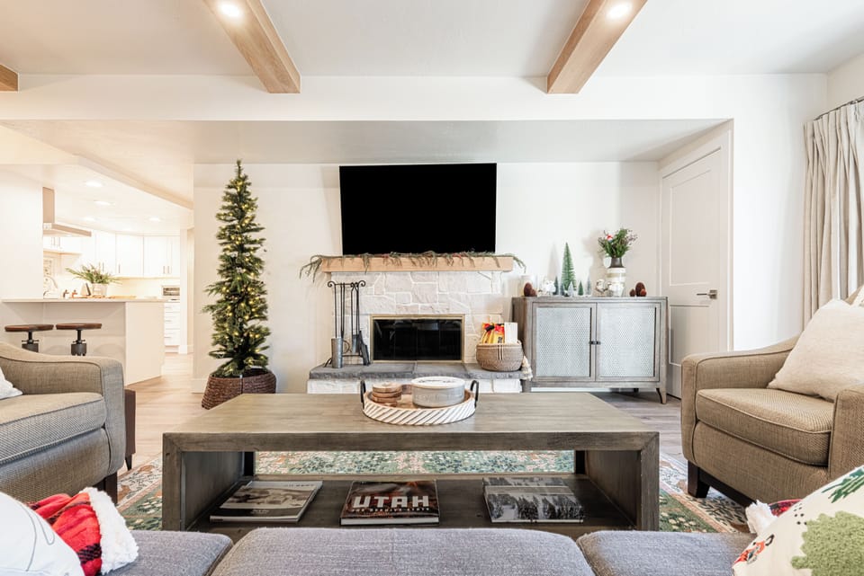 Open living space flowing into dining and kitchen