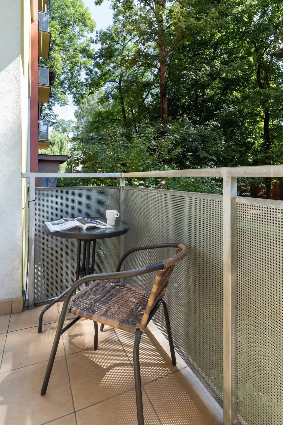 A furnished balcony allows you to spend time outdoors,