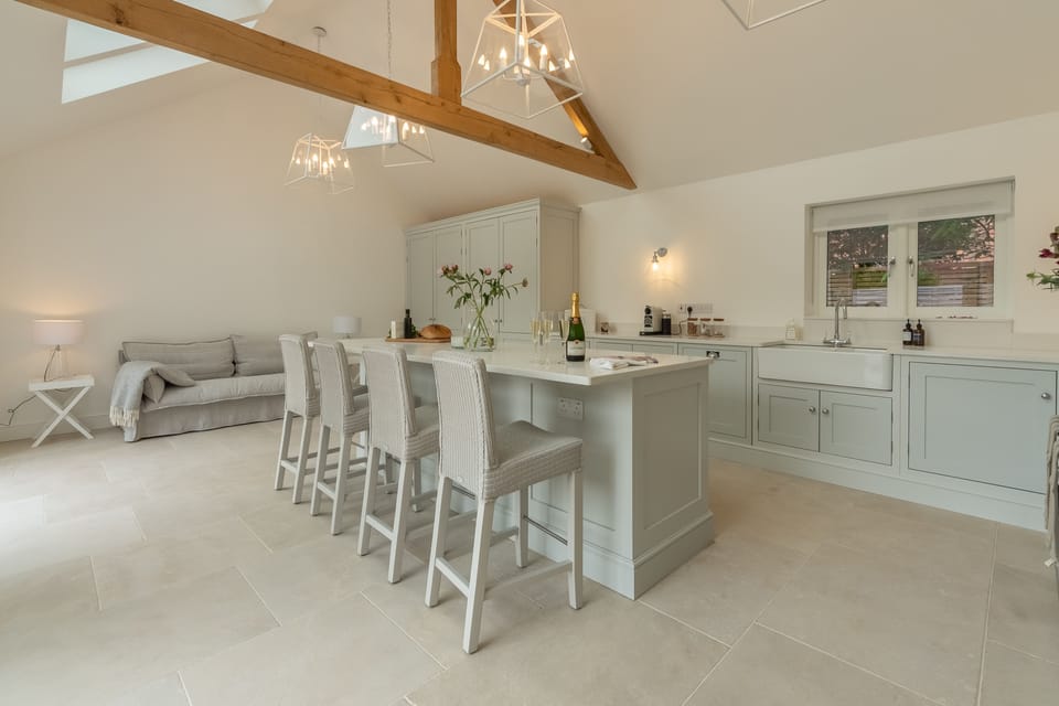 Ground floor: The kitchen has a breakfast bar and double Butler sink
