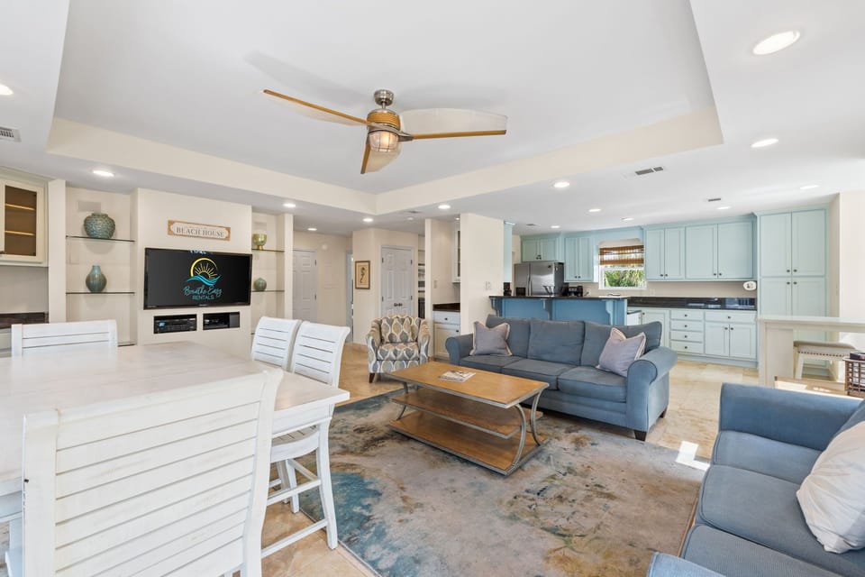 Fully equipped kitchen featuring stainless stell appliances, granite counter tops and a breakfast bar -perfect for cooking and entertaining while overlooking the water.

Professionally Managed by
Breathe Easy Rentals