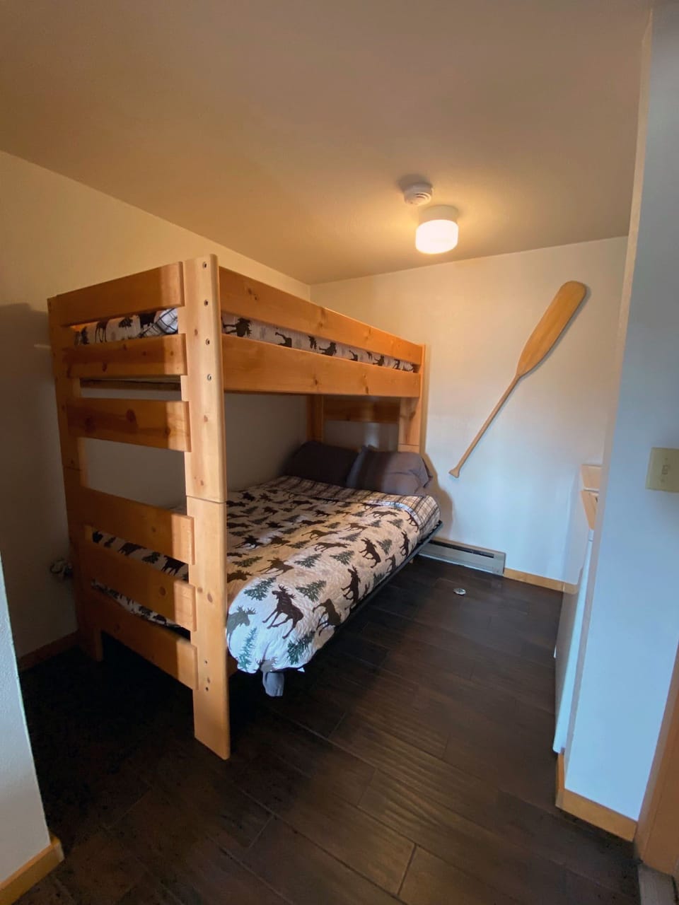 Bunk room, full bed twin above,  washer and dryer