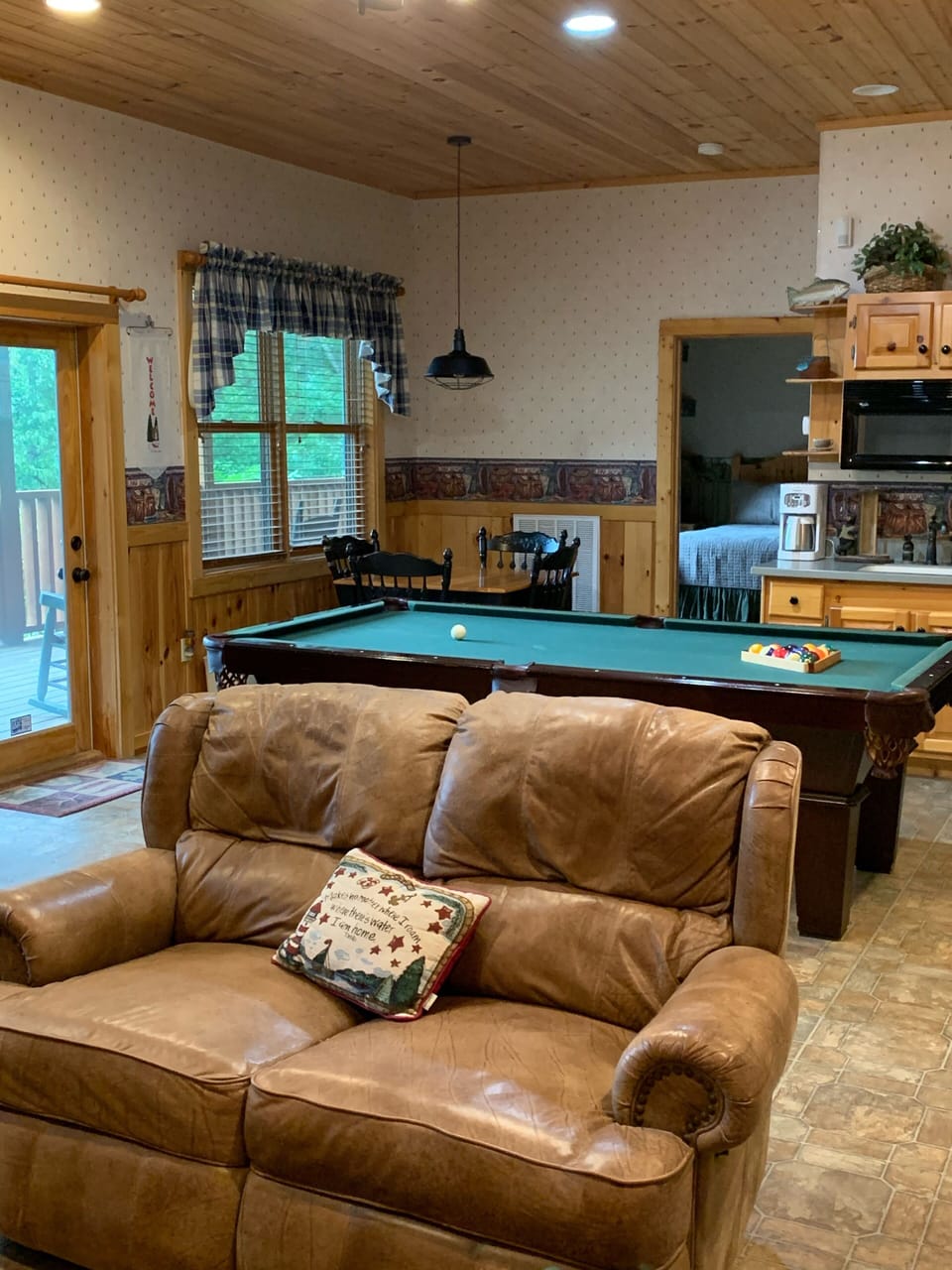 Make great memories in family room/game room on lower level