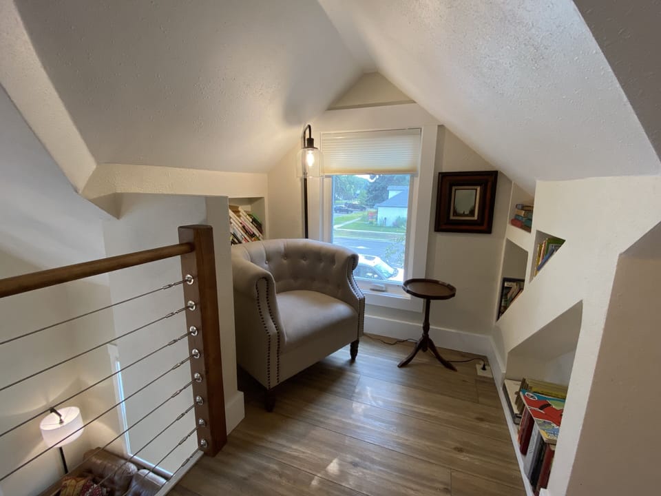 Upstairs, you'll find additional sleeping space in the loft along with a cozy reading nook