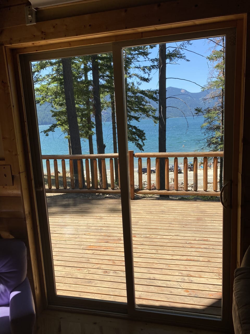 View from the living room looking at the lake. July 2021