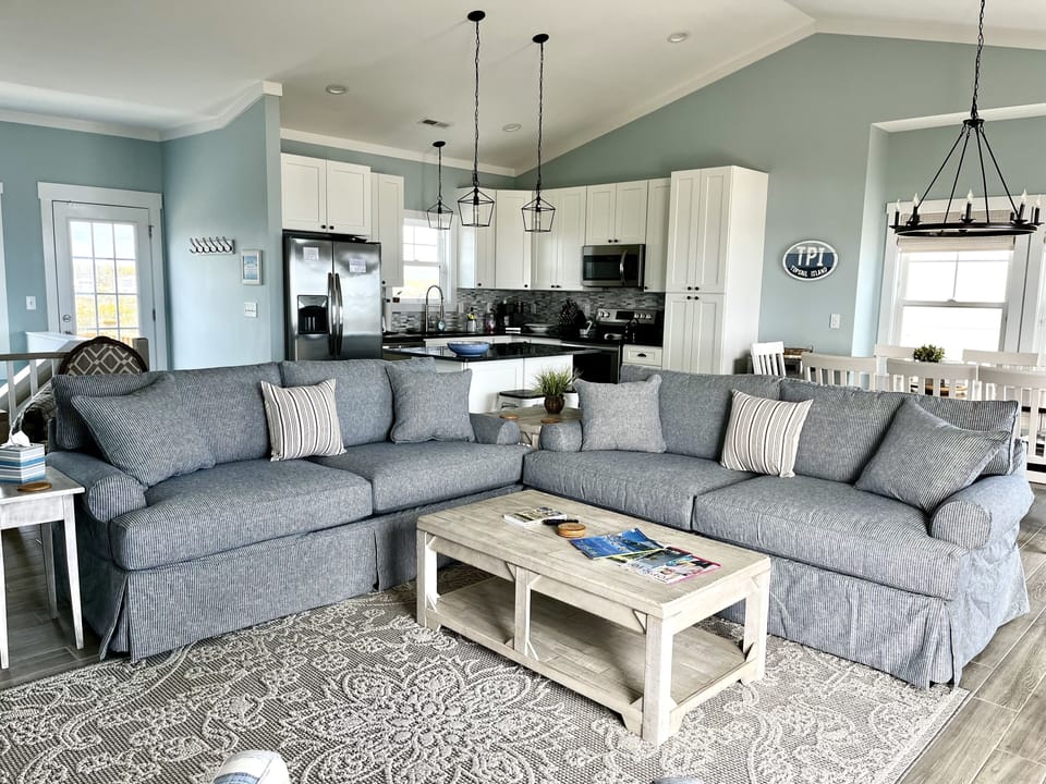 Open kitchen, dining and living areas
