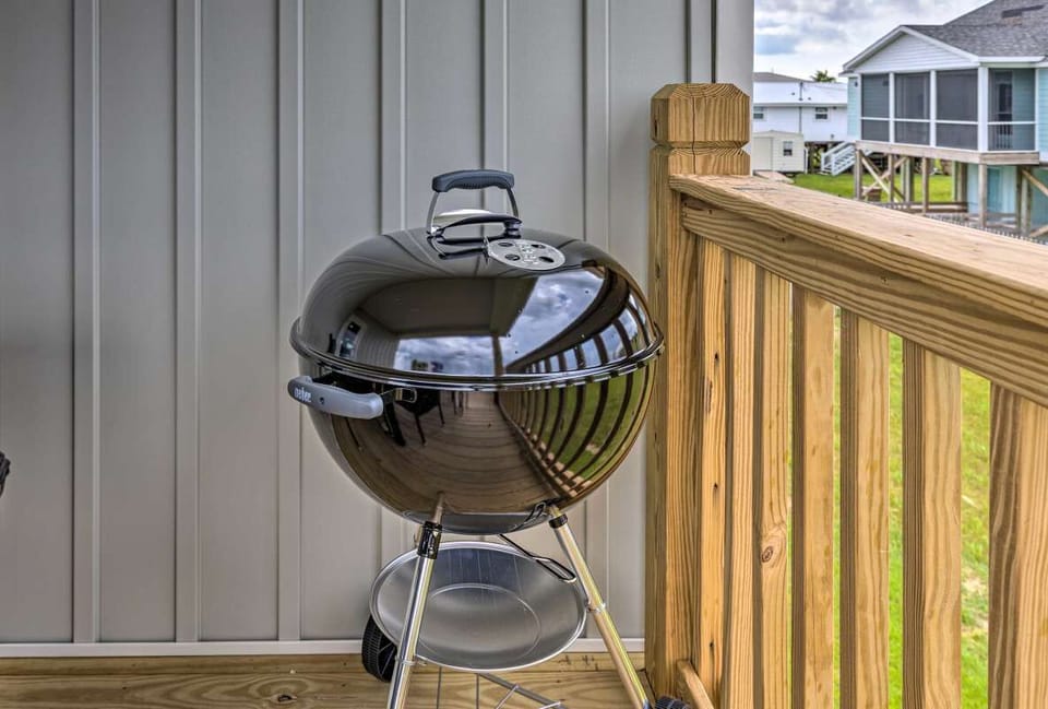 Charcoal grill and briquettes provided
