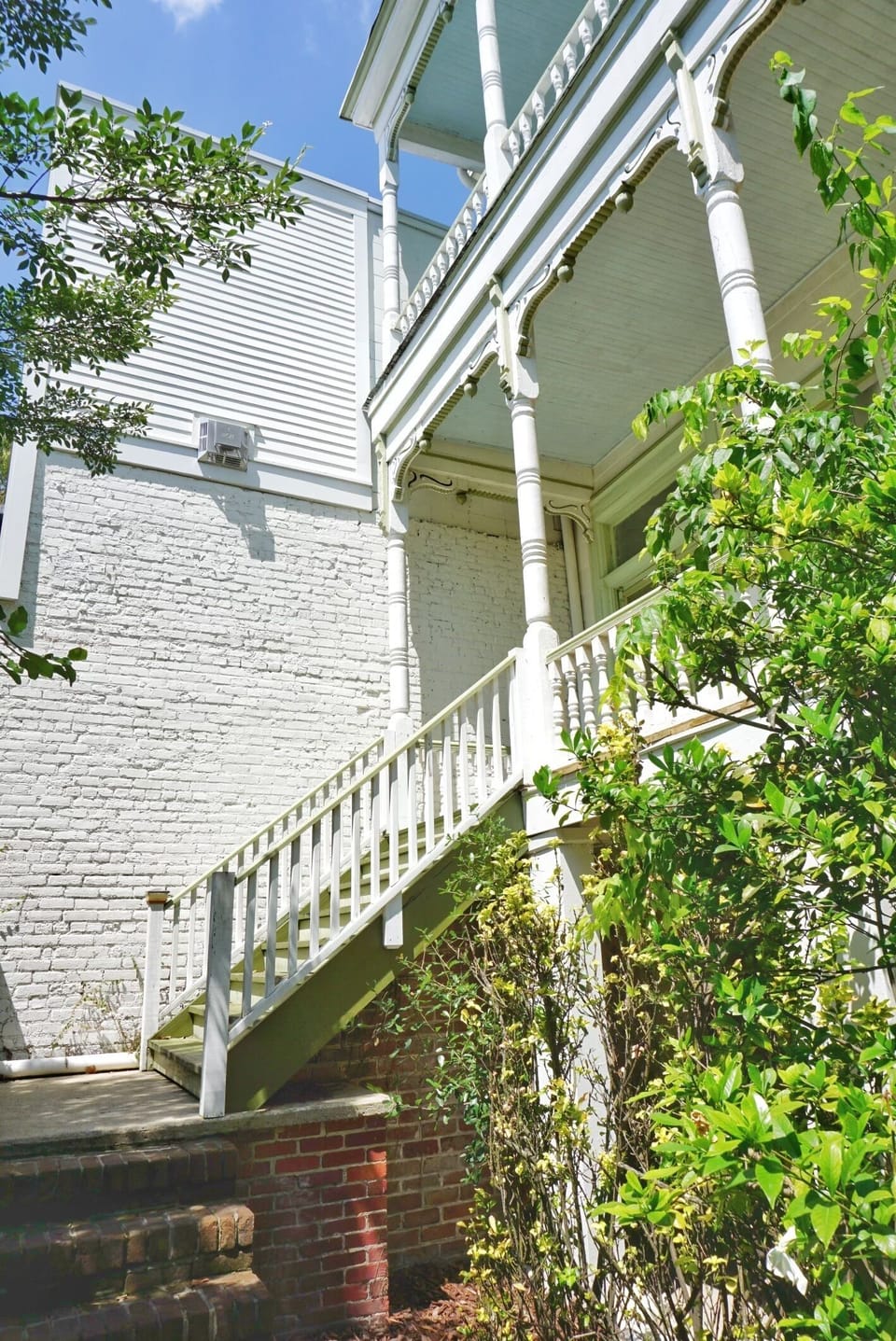 After entering the gated courtyard, head up these stairs to the entrance.