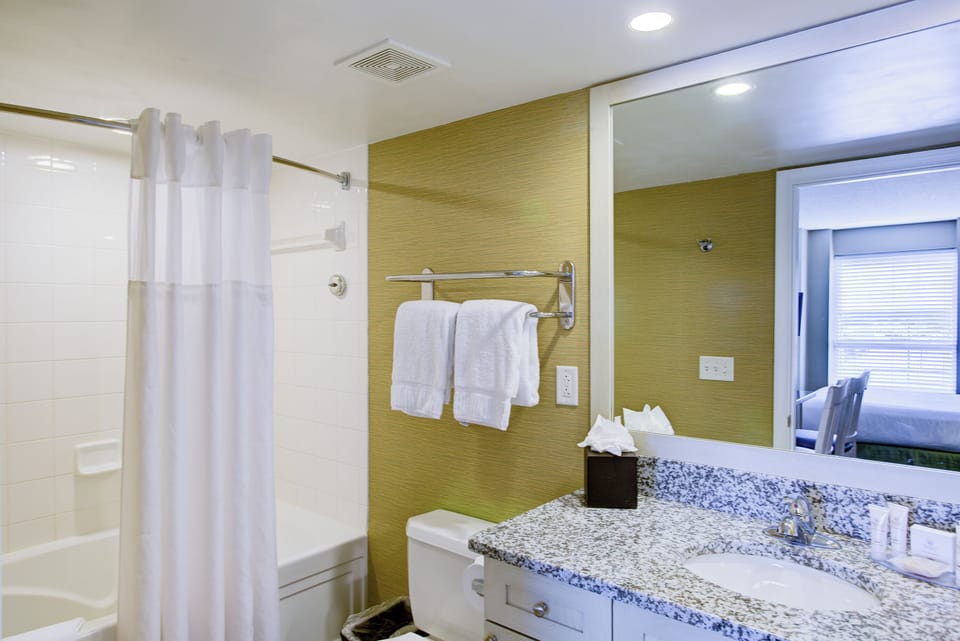Refresh after the beach with a bright, clean tub-shower.