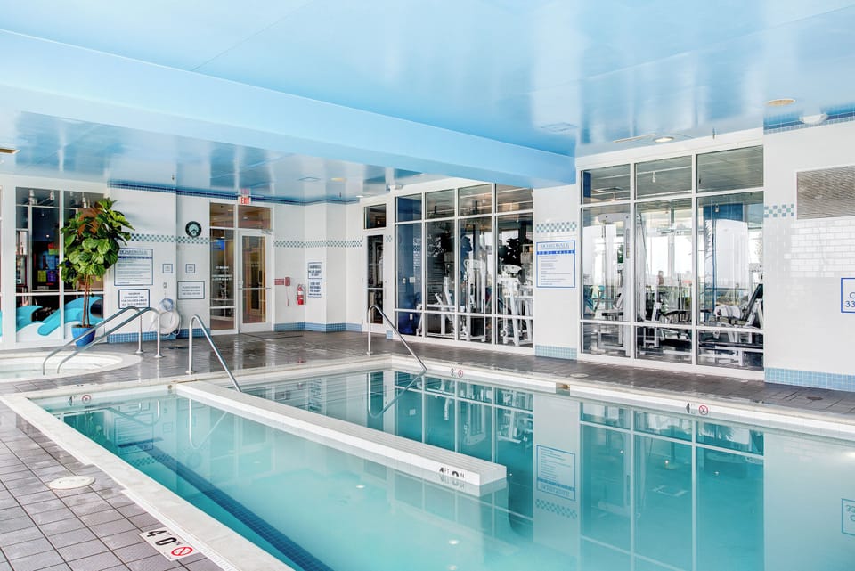 Soak up calm vibes beside the sparkling indoor pool.