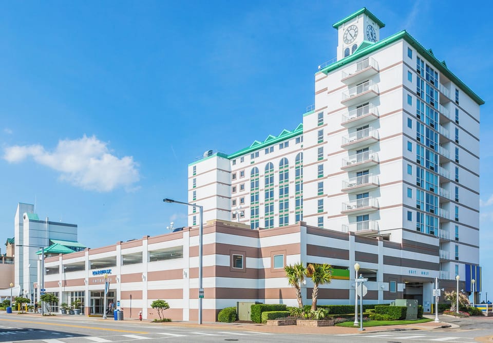 Feel the coastal energy with a crisp street-side arrival view.