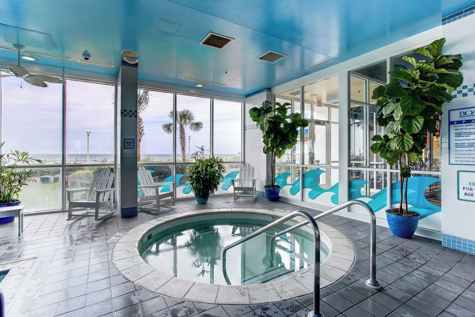 Unwind in the bubbling hot tub after a beach day.