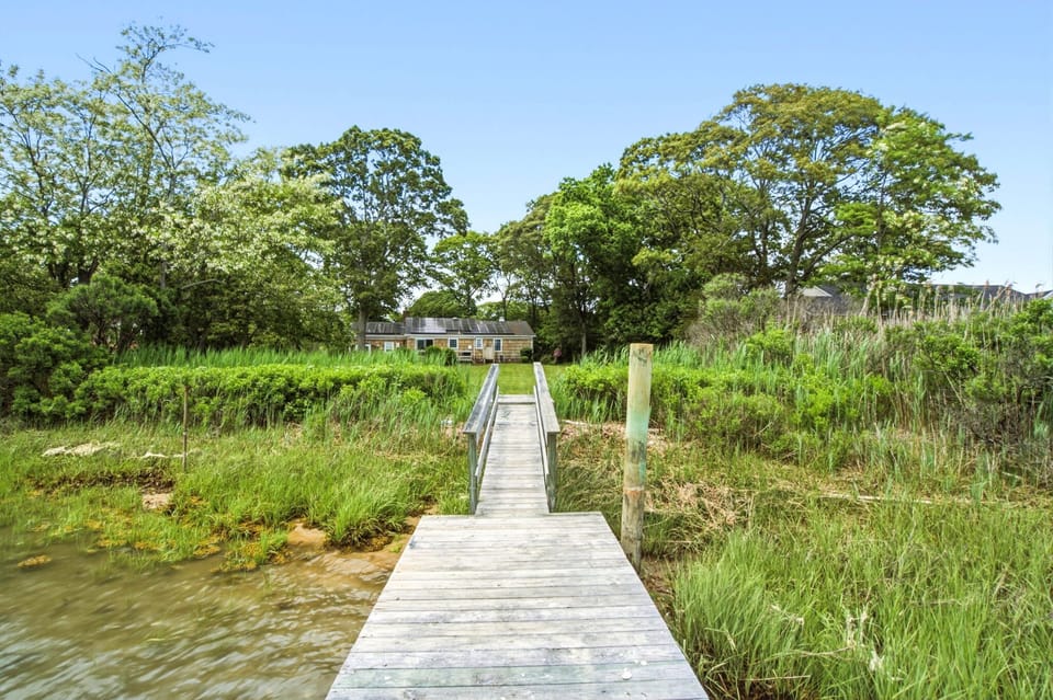 Private dock on the creek with kayak launch