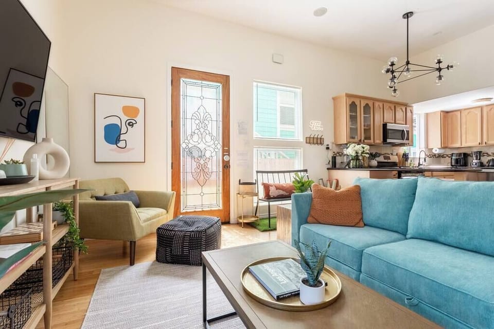 Perfect for relaxing, our living room features modern decor and ample seating.