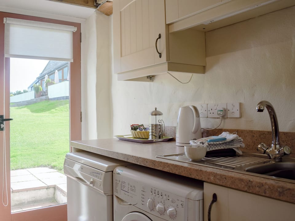 Kitchen | Boot Cottage - Celtic Haven Resort, Lydstep, near Tenby