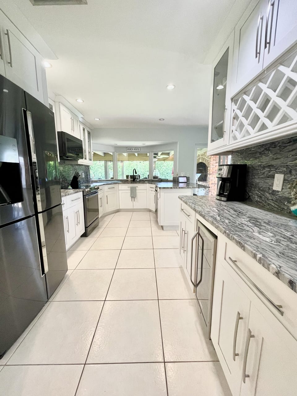 Recently upgraded kitchen with slider to covered patio