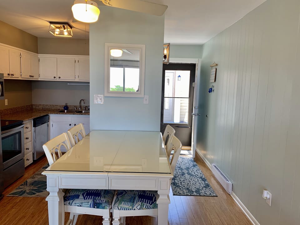 Eating area
3 more foldable chairs under the beds 
The condo is 720 sqft