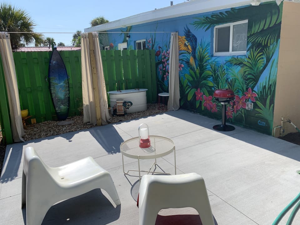 Backyard Patio with hot/cold shower and stock tank tub, BBQ, 