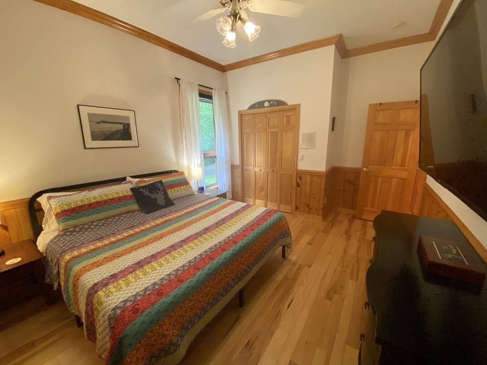 Hallway bedroom, with king bed.