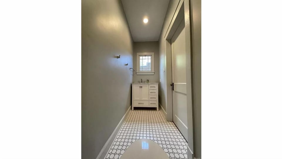 Half Bath Attached to Bedroom 1