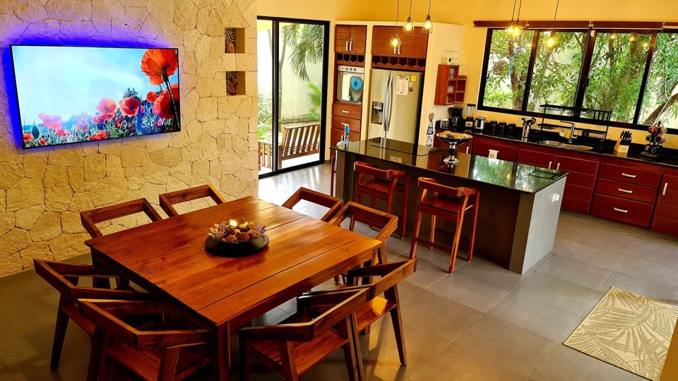 Dining room with 70" Smart TV.
Seats 8