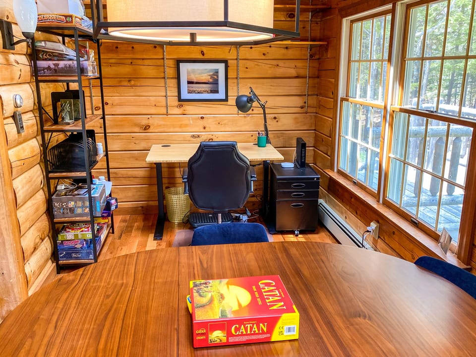 Sit-stand desk in the game room
