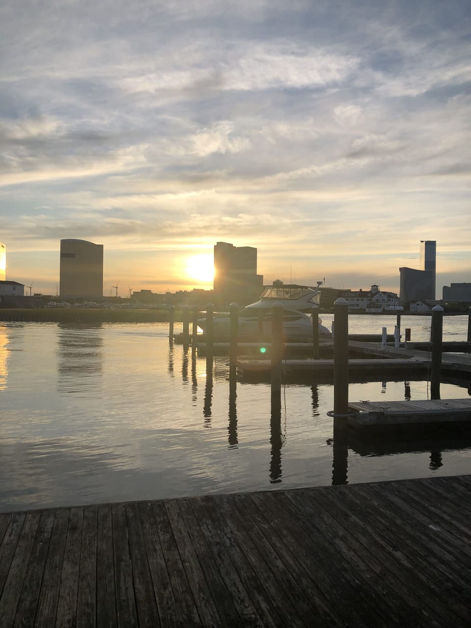 Gardner's Basin sunset where you can enjoy a bite and some drinks on the water