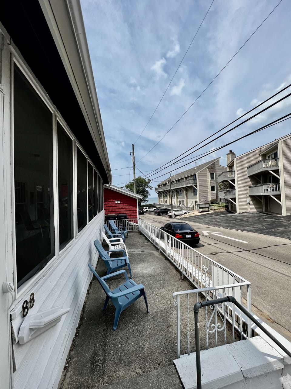 Front patio is great to watch the parade of families walking down to the beach