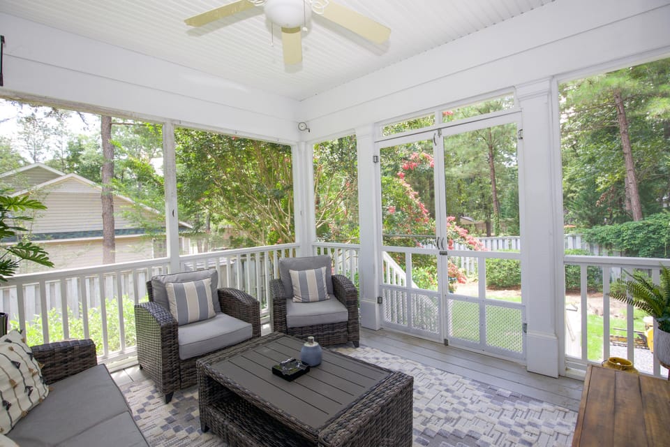Welcome to our screened porch!  Gardenia shrubs provide fragrance in the Spring!