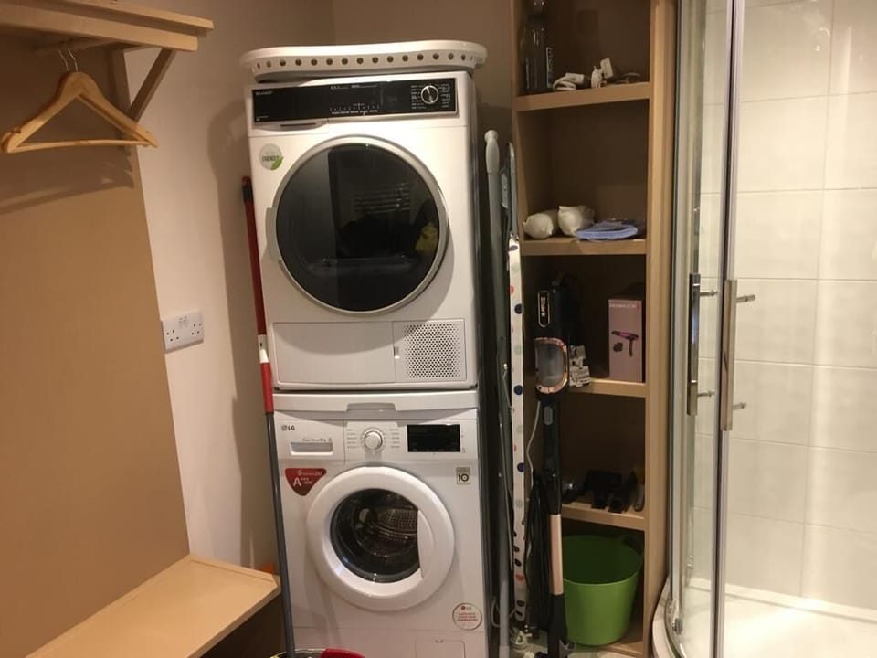 Heatpump drier .8KG washing machine,ironing board 
Storage for coats and boots .