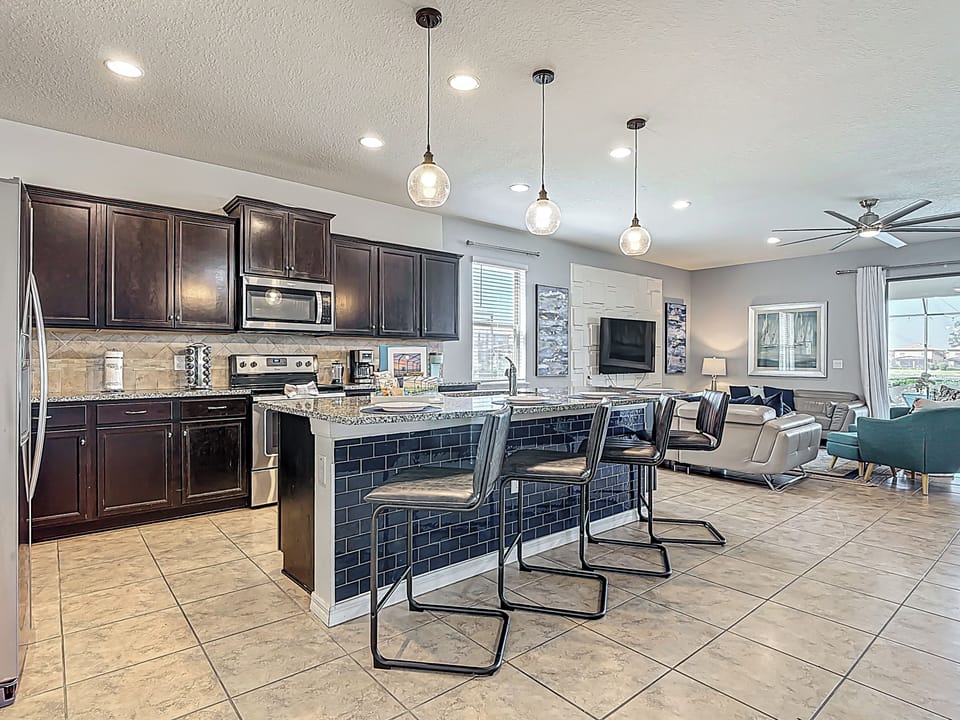 Inviting open floorplan with kitchen, family room and dining room.