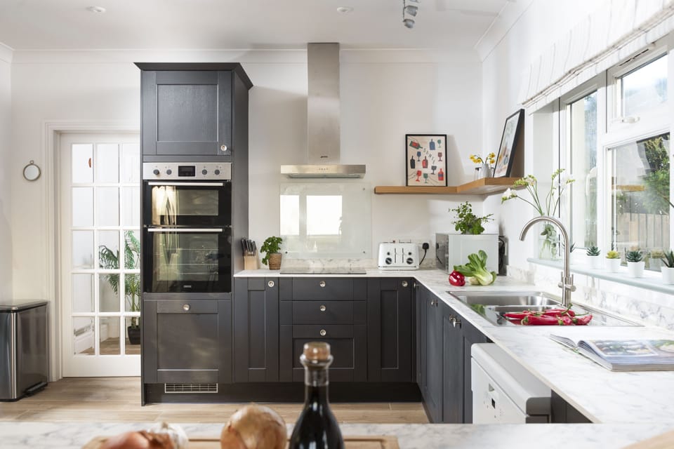 Westaway House, Trelights. Ground Floor: With a double electric oven and hob, dishwasher, microwave and American-style fridge/freezer