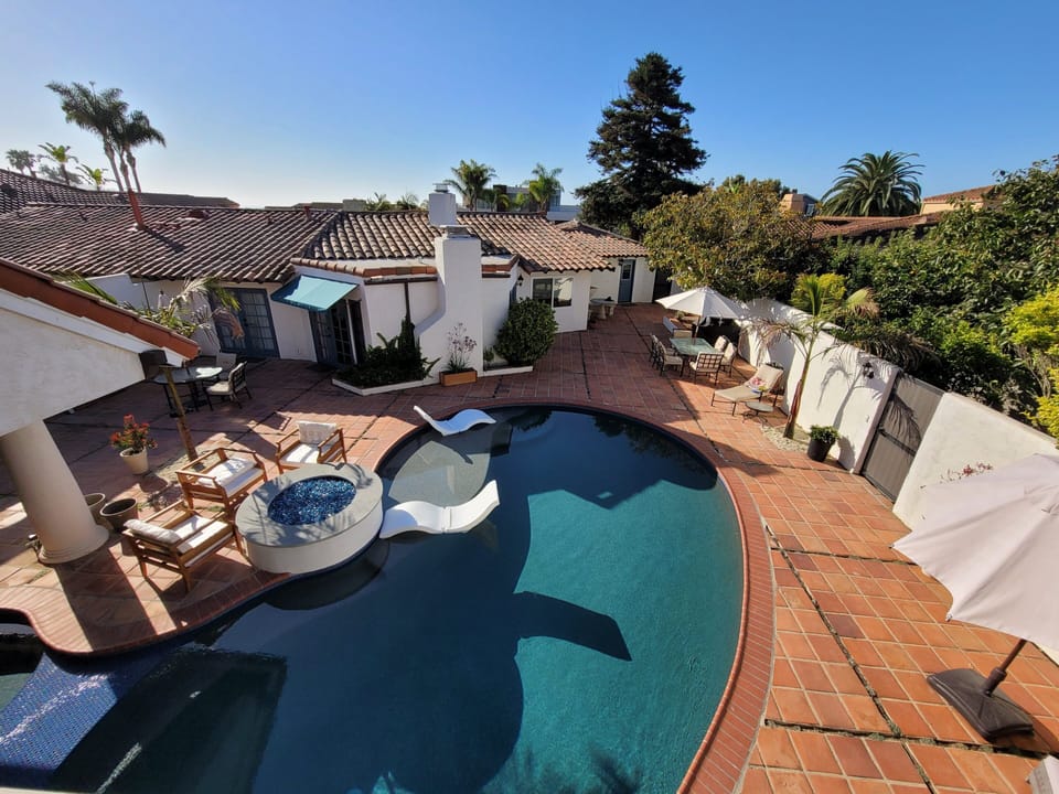 Property features two separate homes anchored by new pool/spa.
