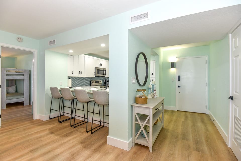 Main entryway. Second bedroom is right off the kitchen bar area.
