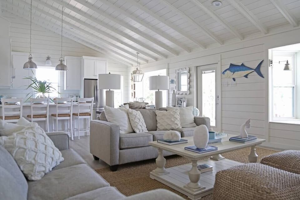 Large, open living area with vaulted ceiling and lots of natural light