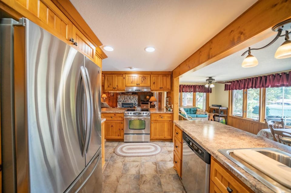 Centrally located and open kitchen.  High end appliances and view of the lake.