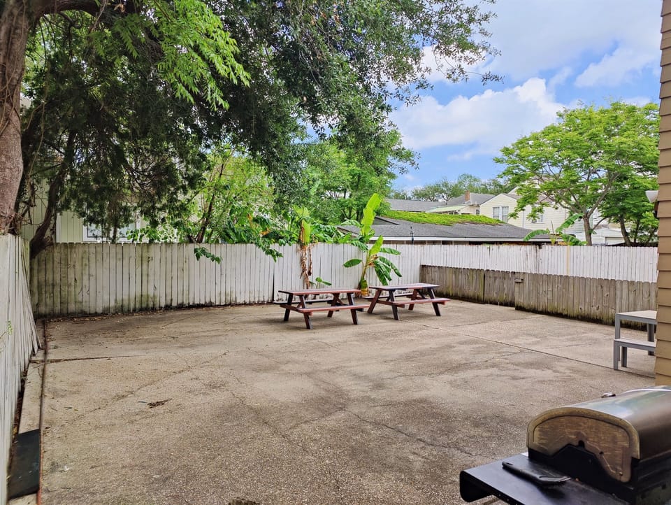 Rear courtyard shared with upstairs unit.