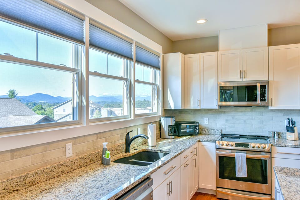 Enjoy mountain views from the gorgeous chef's kitchen