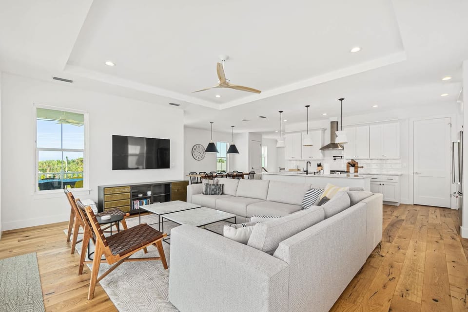 Relax on the plush sofa in the spacious living area surrounding the Smart TV
