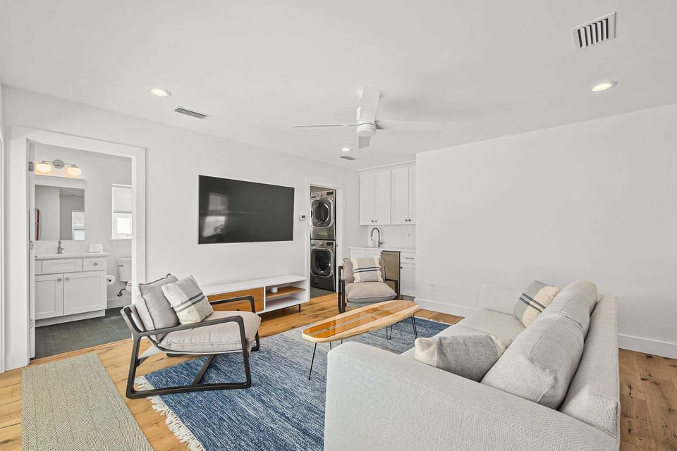 Modern, beachy vibes give this home the perfect ambiance