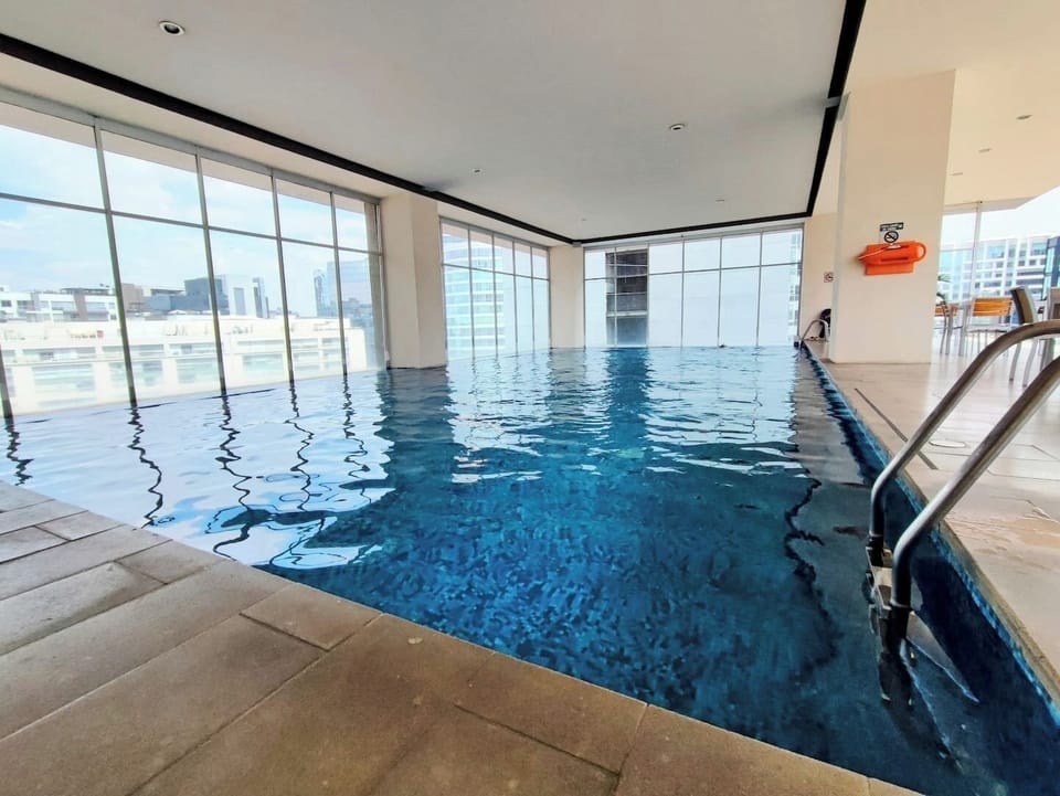 On the 16th floor, you'll find a stunning pool offering breathtaking views. Unwind in its serene waters and enjoy the poolside ambiance. Adjacent is the bar/cafeteria, where you can indulge in refreshing drinks and delicious snacks.